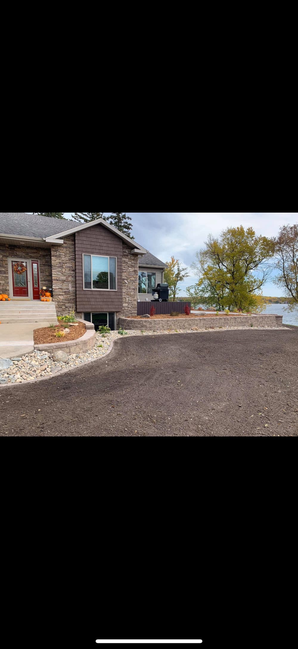 Residential Landscape Design with Retaining Wall image