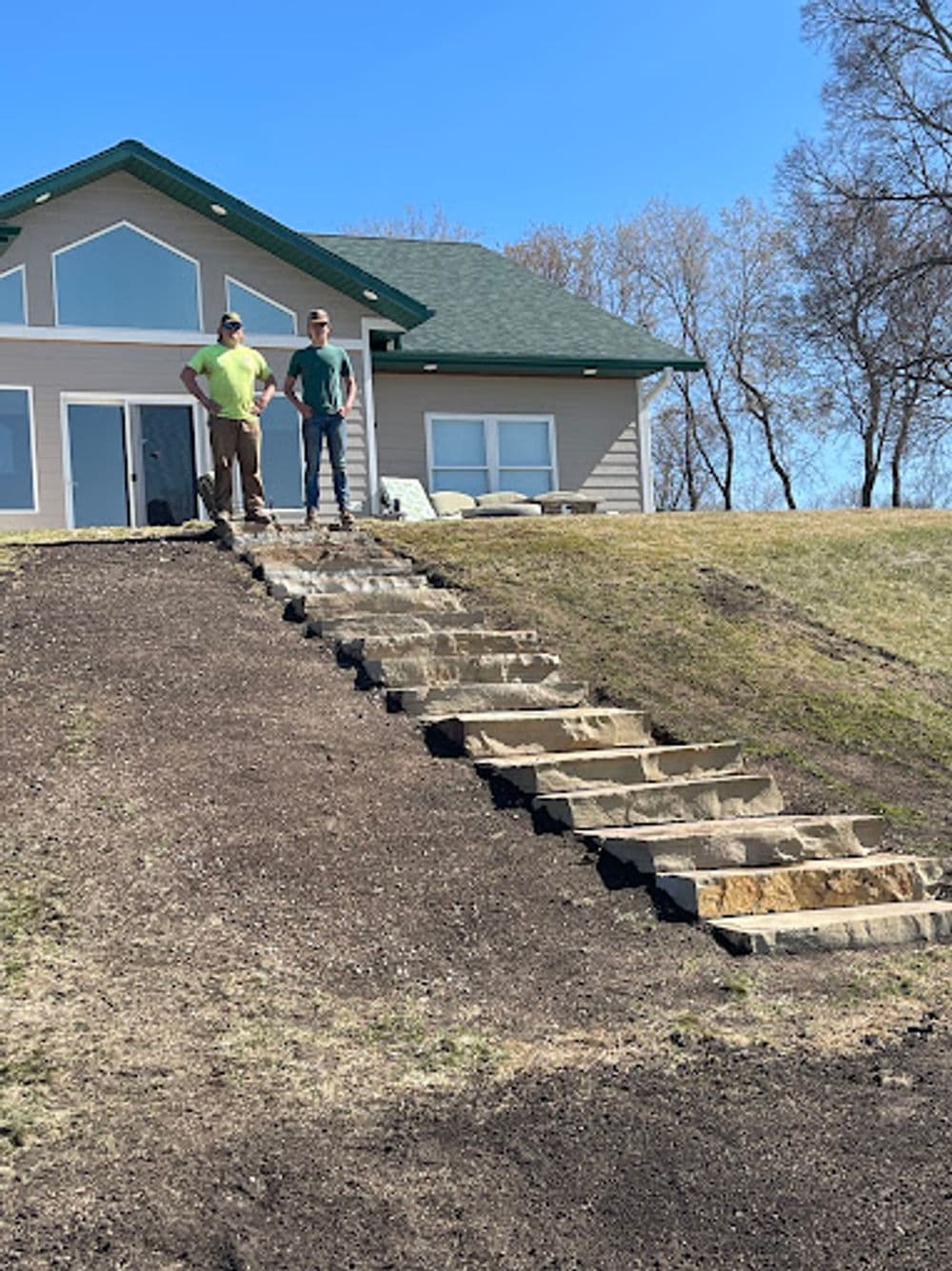 Stone Staircase Installation on Sloped Landscape image